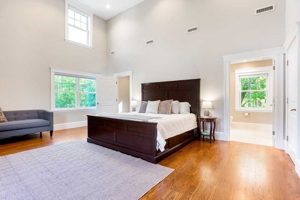 98 Middlesex Street Winchester, MA 01890 - Photo 15 of 35 a bed room with a bed and a couch