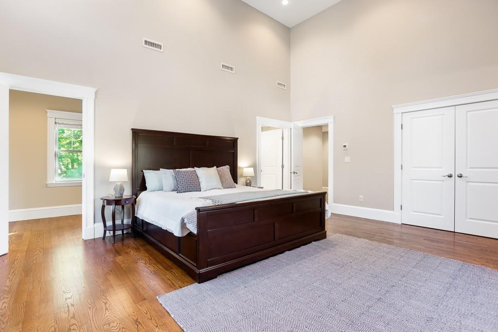 98 Middlesex Street Winchester, MA 01890 - Photo 16 of 35 a bed room with a bed and a night stand