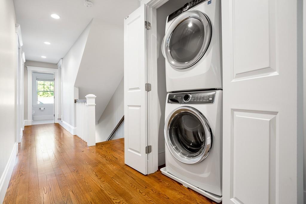 98 Middlesex Street Winchester, MA 01890 - Photo 19 of 35 a view of a hallway with washer and dryer