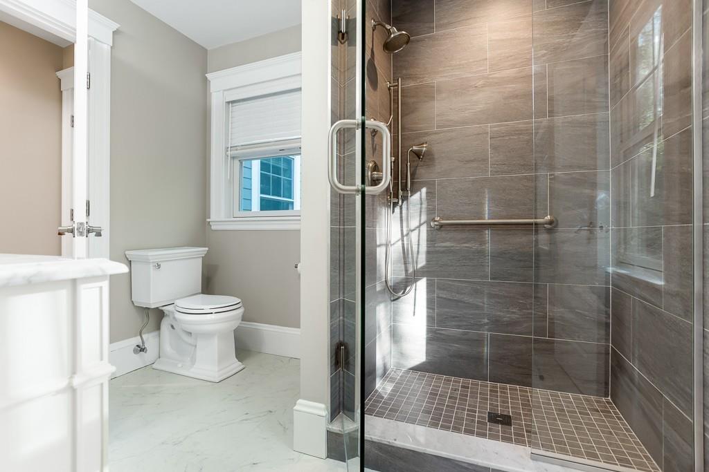 98 Middlesex Street Winchester, MA 01890 - Photo 21 of 35 a bathroom with a toilet and a shower