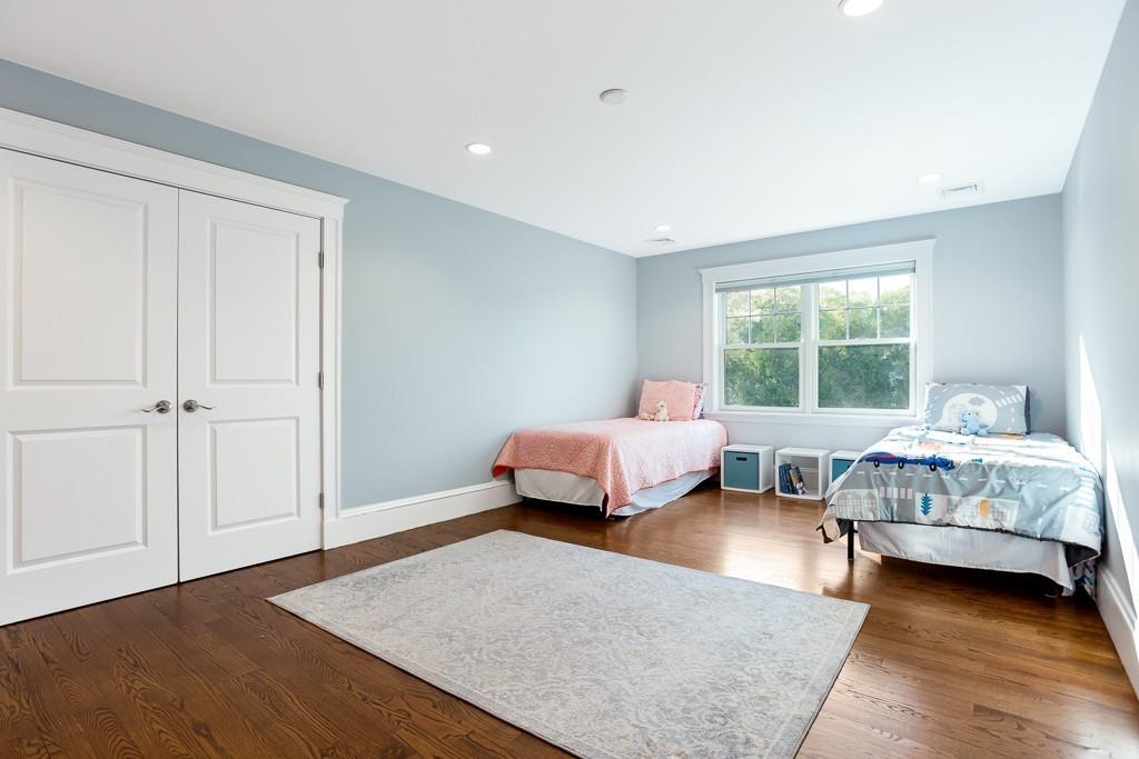 98 Middlesex Street Winchester, MA 01890 - Photo 23 of 35 a bedroom with a bed and a couch