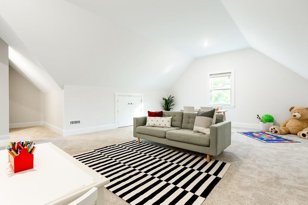 98 Middlesex Street Winchester, MA 01890 - Photo 30 of 35 a living room with furniture and a couch