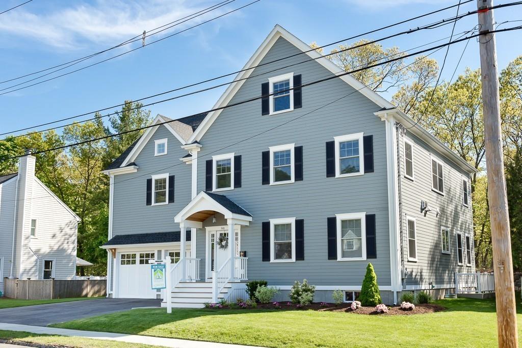 98 Middlesex Street Winchester, MA 01890 - Photo 32 of 35 a front view of a house with a yard