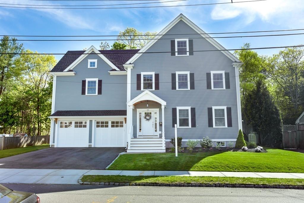 98 Middlesex Street Winchester, MA 01890 - Photo 33 of 35 a front view of a house with a yard