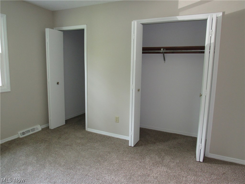 48-50 Hurst Road Painesville, OH 44077 - Photo 14 of 34 Two closets in the master bedroom! The one on the left is a walk-in closet!