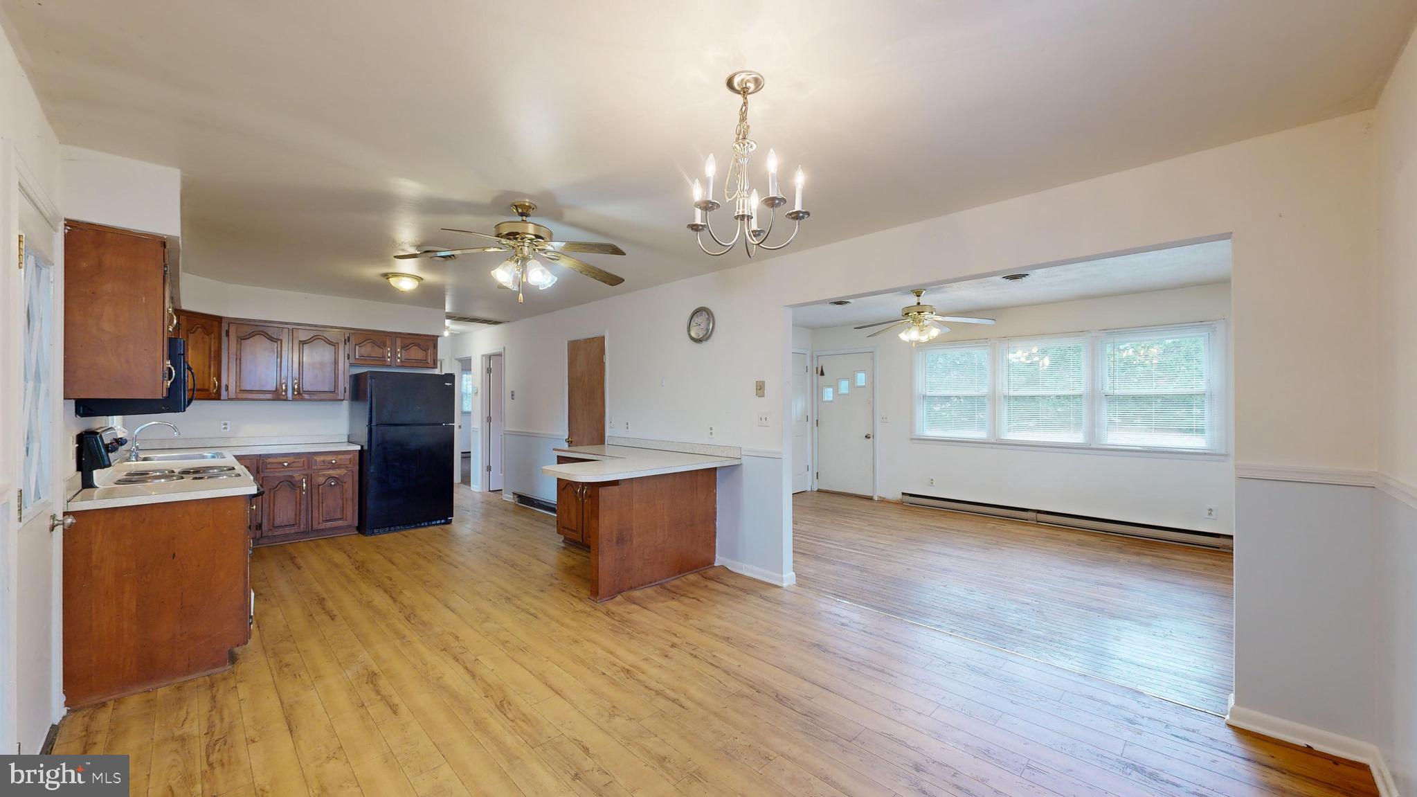 20764 Fleatown Road Lincoln, DE 19960 - Photo 7 of 38 Dining Room/Kitchen/Living Room