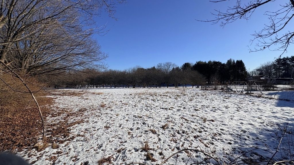 10 Lanseigne Street Dracut, MA 01826 - Photo 4 of 5 a view of swimming pool with a yard