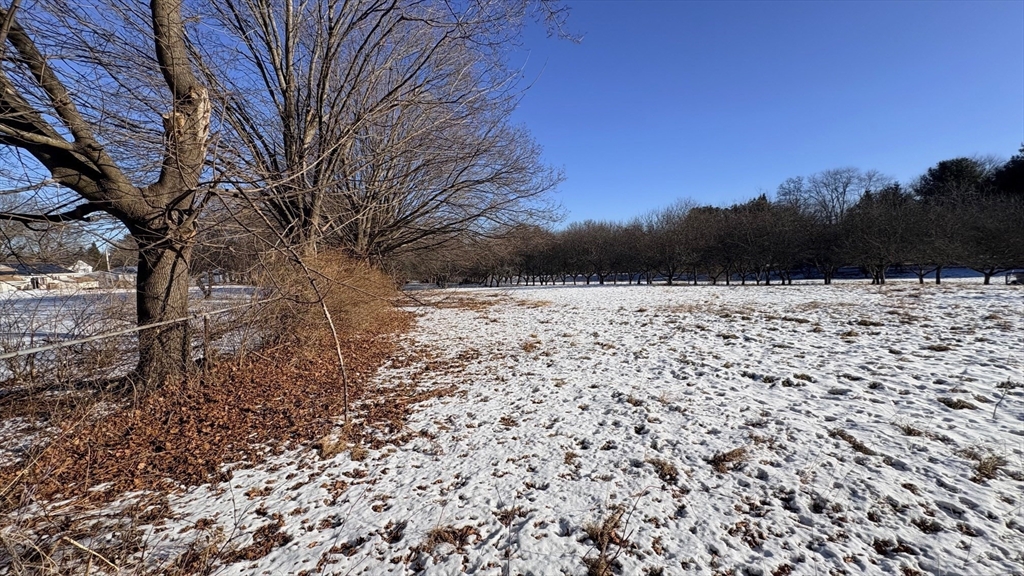 10 Lanseigne Street Dracut, MA 01826 - Photo 5 of 5 a view of snow on the road
