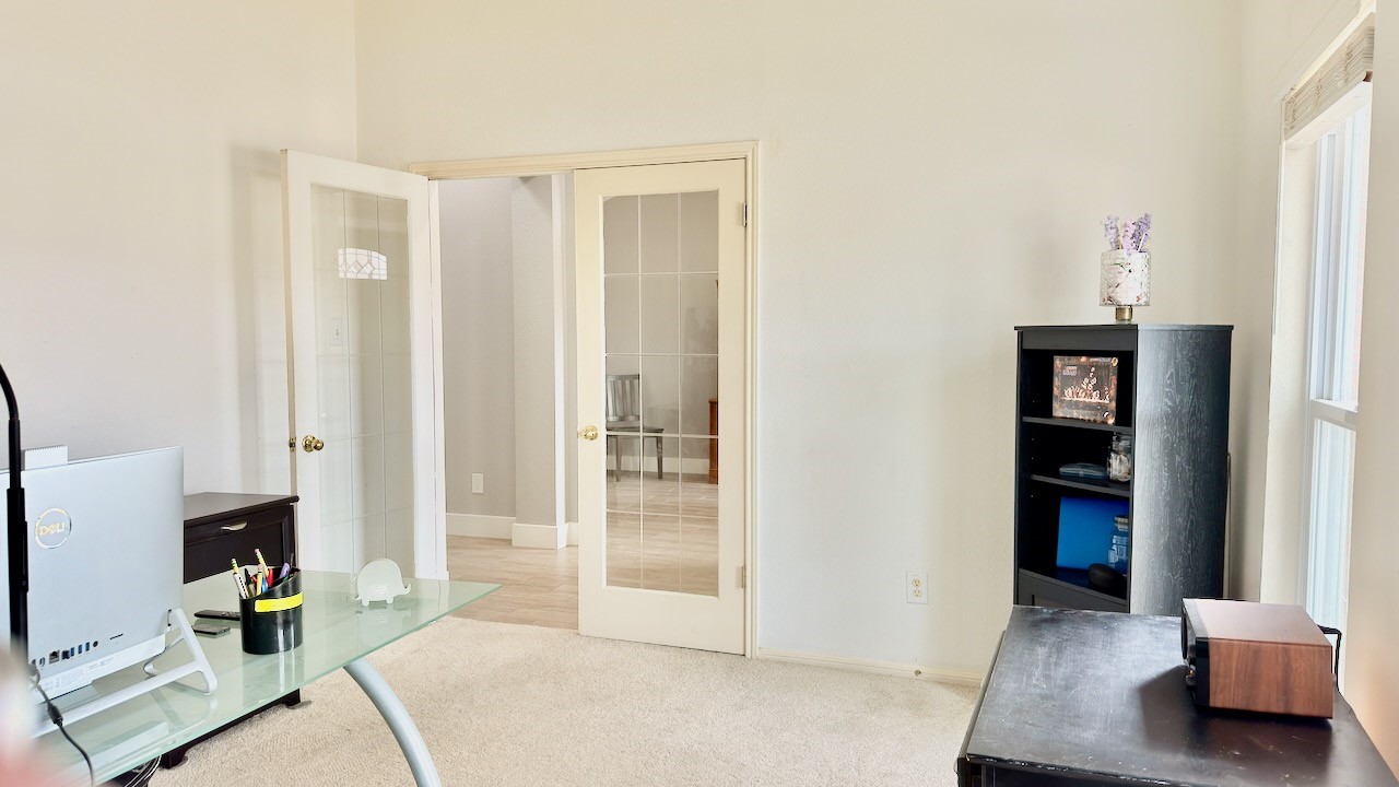 1902 Overland Drive Leander, TX 78641 - Photo 12 of 29 Spacious home office located at the front of the home with french doors. Could be a a library, hobby area or 5th bedroom if desired.