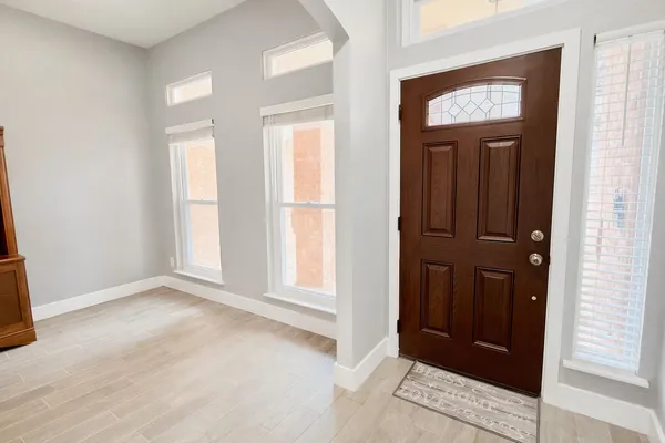 a view of livingroom with hardwood floor and window