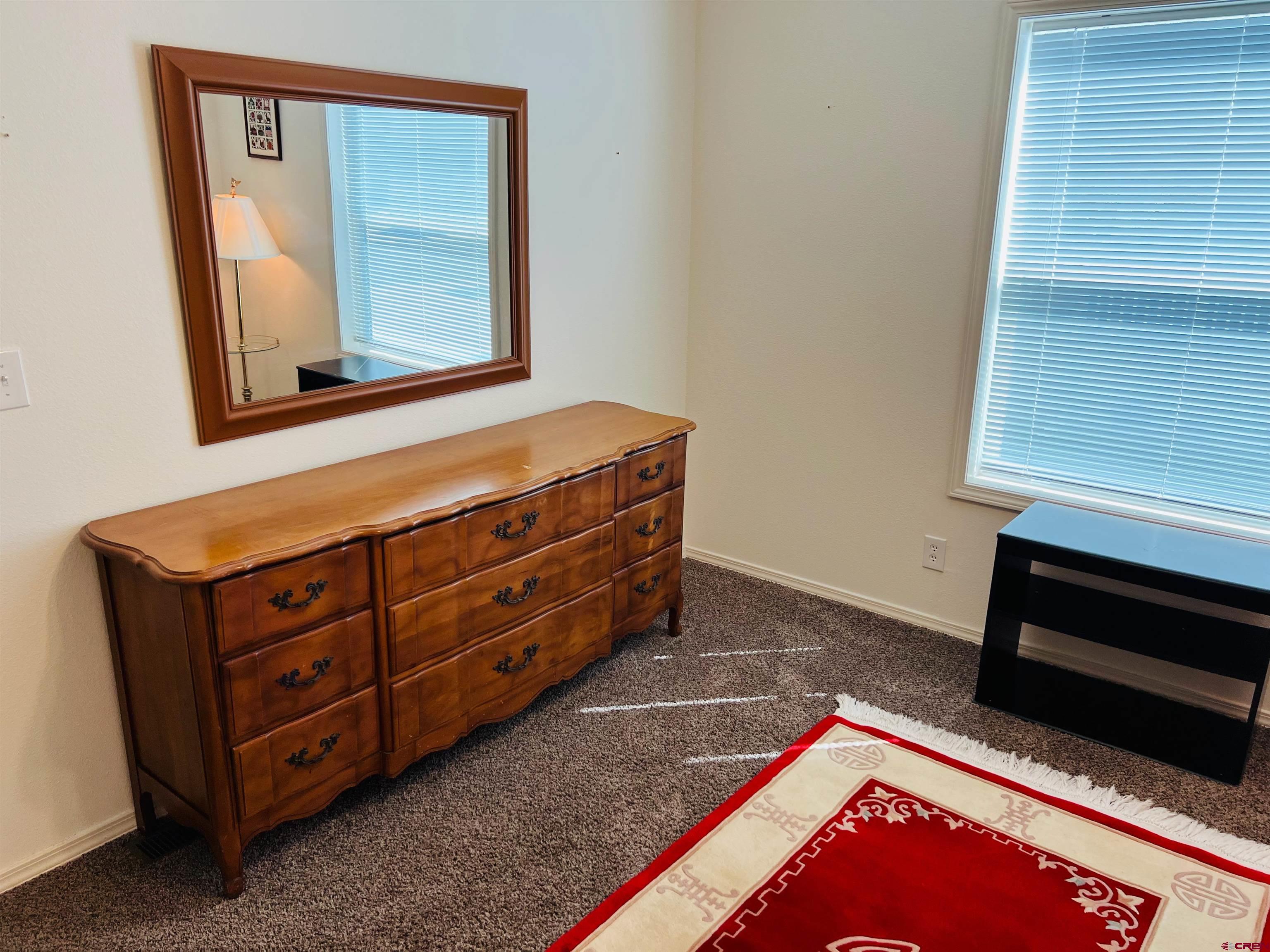 901 6530 Road, Unit 3211 Montrose, CO 81401 - Photo 25 of 34 a living room with furniture
