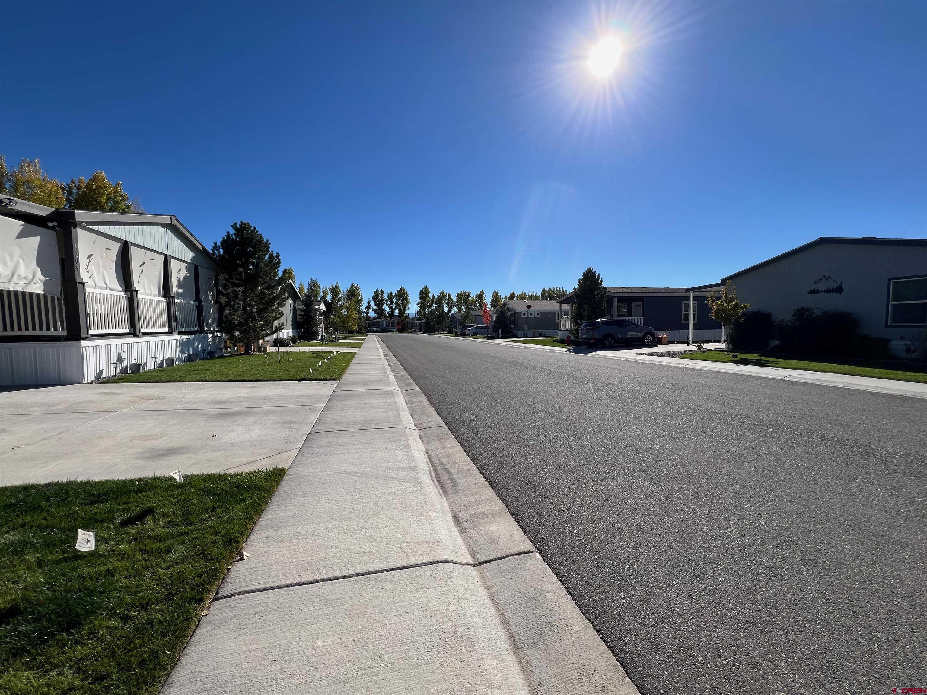 901 6530 Road, Unit 3211 Montrose, CO 81401 - Photo 34 of 34 a view of a street with houses