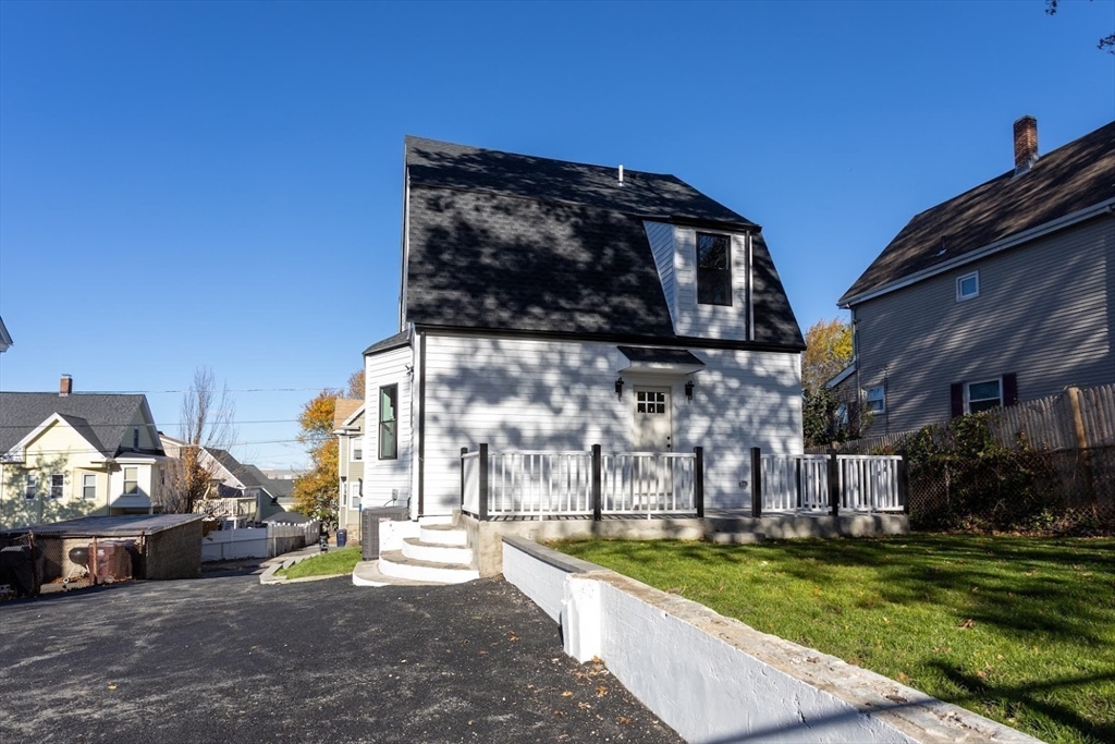 75 Sycamore Street Everett, MA 02149 - Photo 23 of 25 a view of a park with many windows