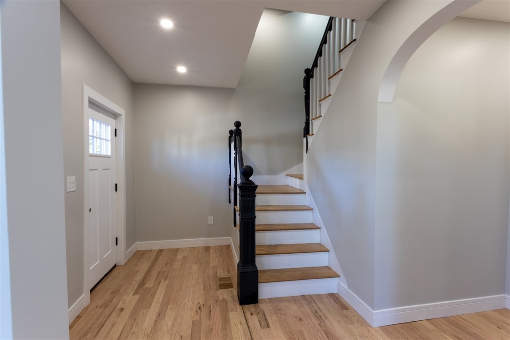 75 Sycamore Street Everett, MA 02149 - Photo 3 of 25 a view of entryway with wooden floor