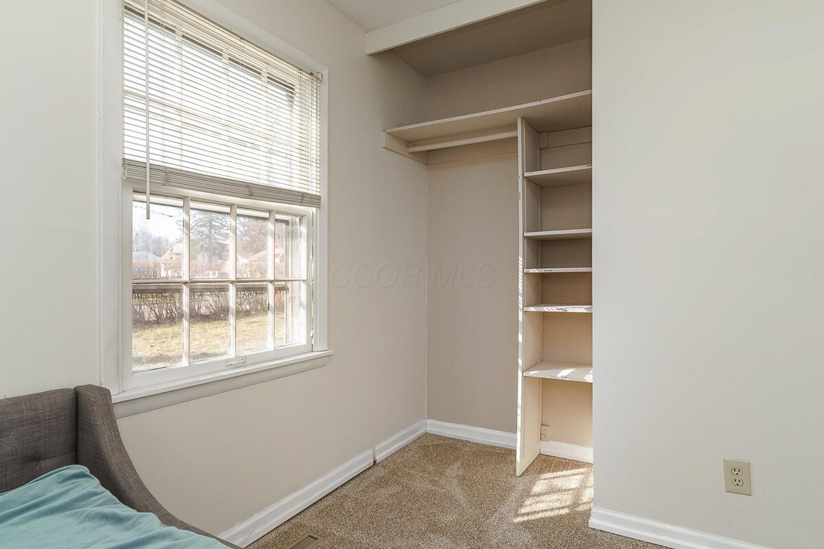 300 Sturbridge Road Columbus, OH 43228 - Photo 26 of 31 Built-in shelving in bedroom 2 closet