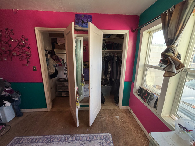 102 South Main Street Paris, ID 83261 - Photo 19 of 33 Bedroom with dark wood-style flooring and baseboards