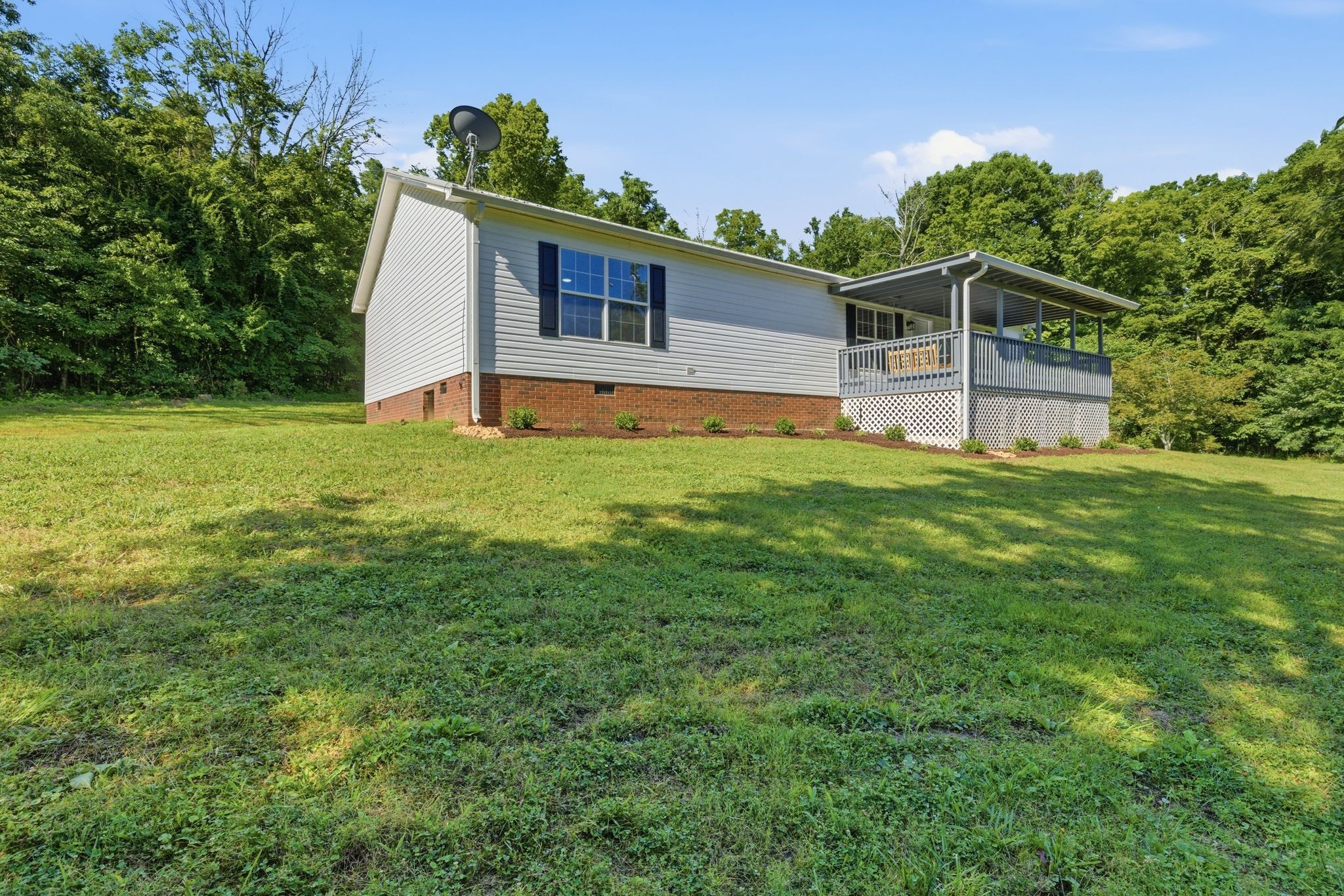 1021 B Jordan Road Lascassas, TN 37085 - Photo 14 of 58 a house view with a garden space