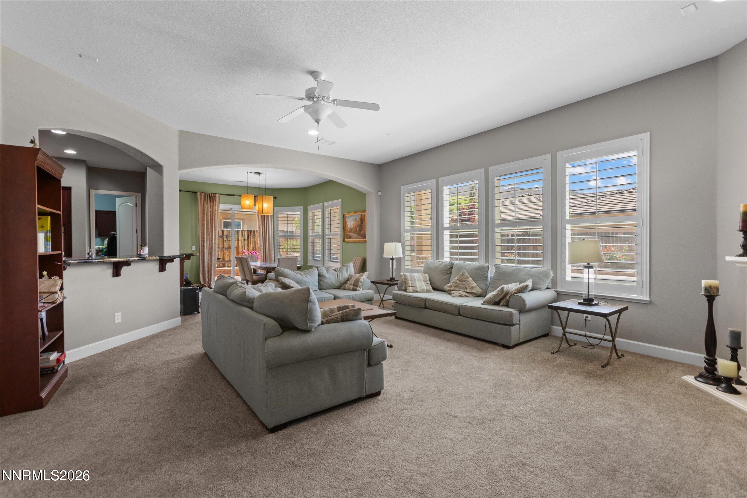 2920 Bull Rider Drive Reno, NV 89521 - Photo 21 of 51 a living room with furniture and a large window