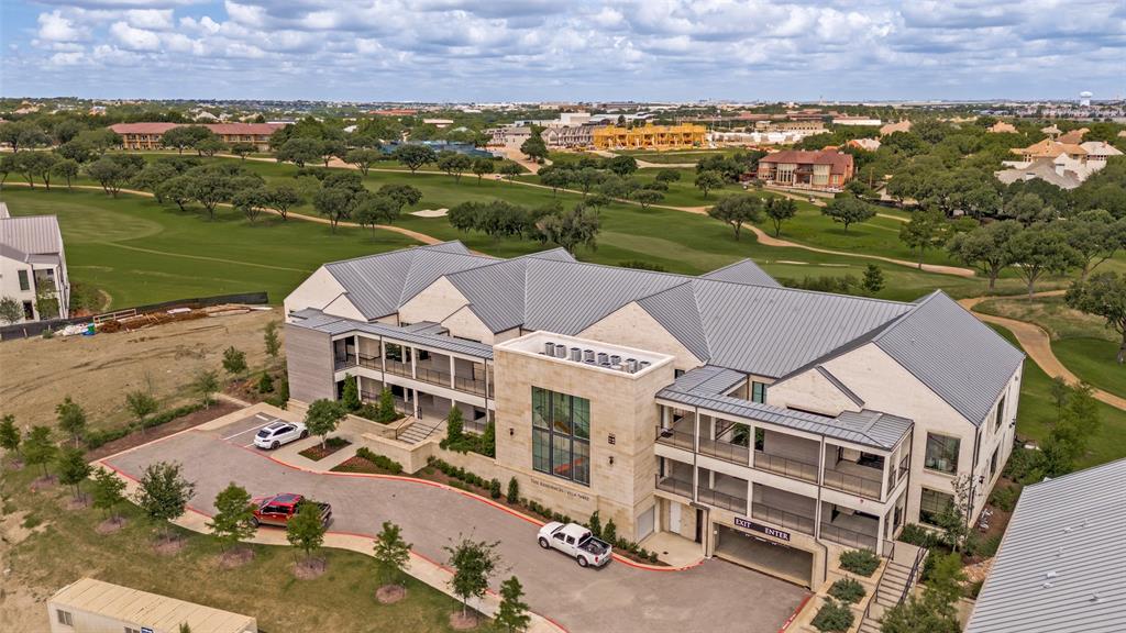 320 North O Connor Ridge Boulevard, Unit 21 Irving, TX 75038 - Photo 3 of 35 Aerial of Villa Three and the futuer common area amenities