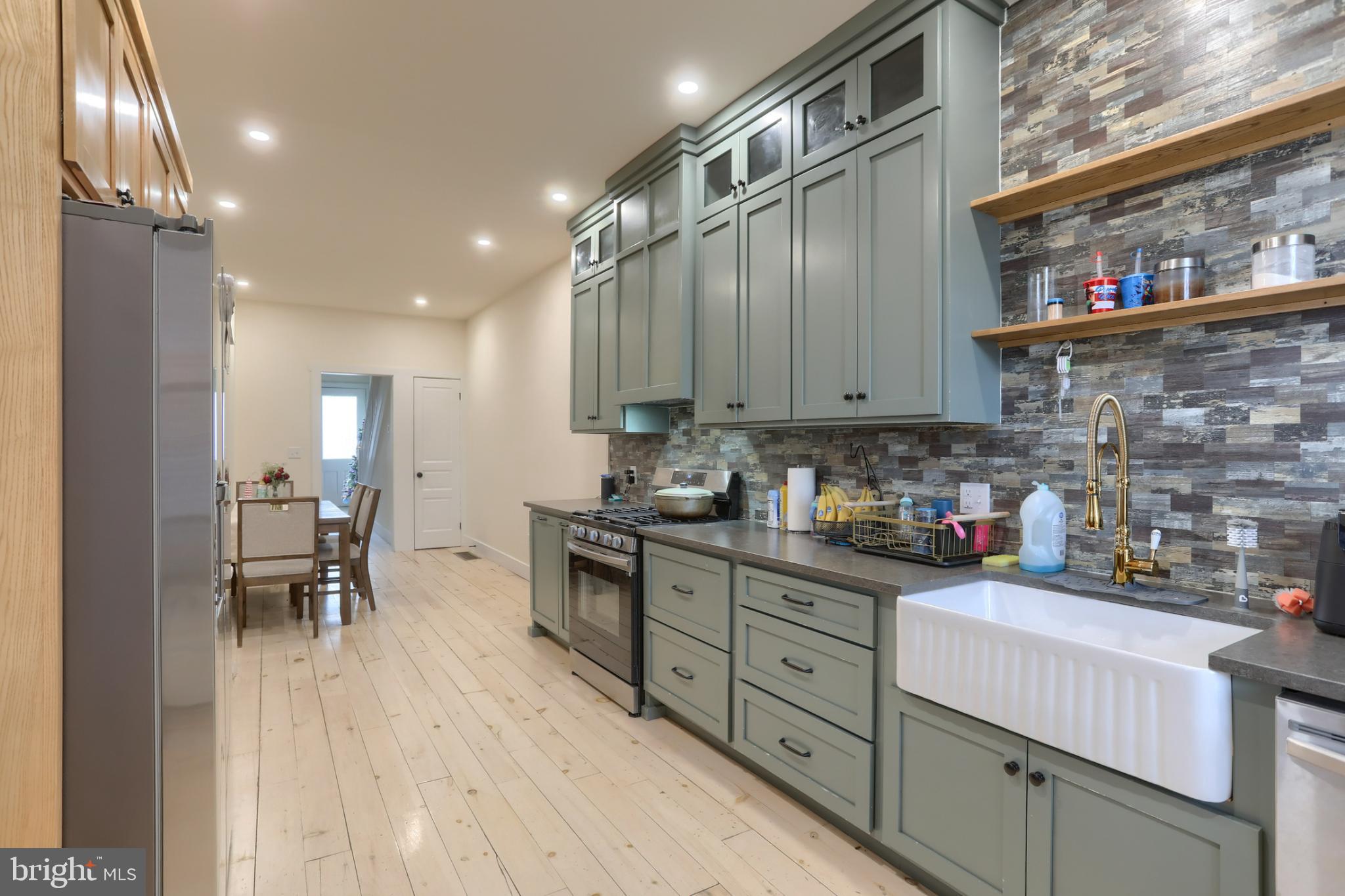 140 South 8th Street Lebanon, PA 17042 - Photo 15 of 34 a kitchen with stainless steel appliances a refrigerator and a stove top oven