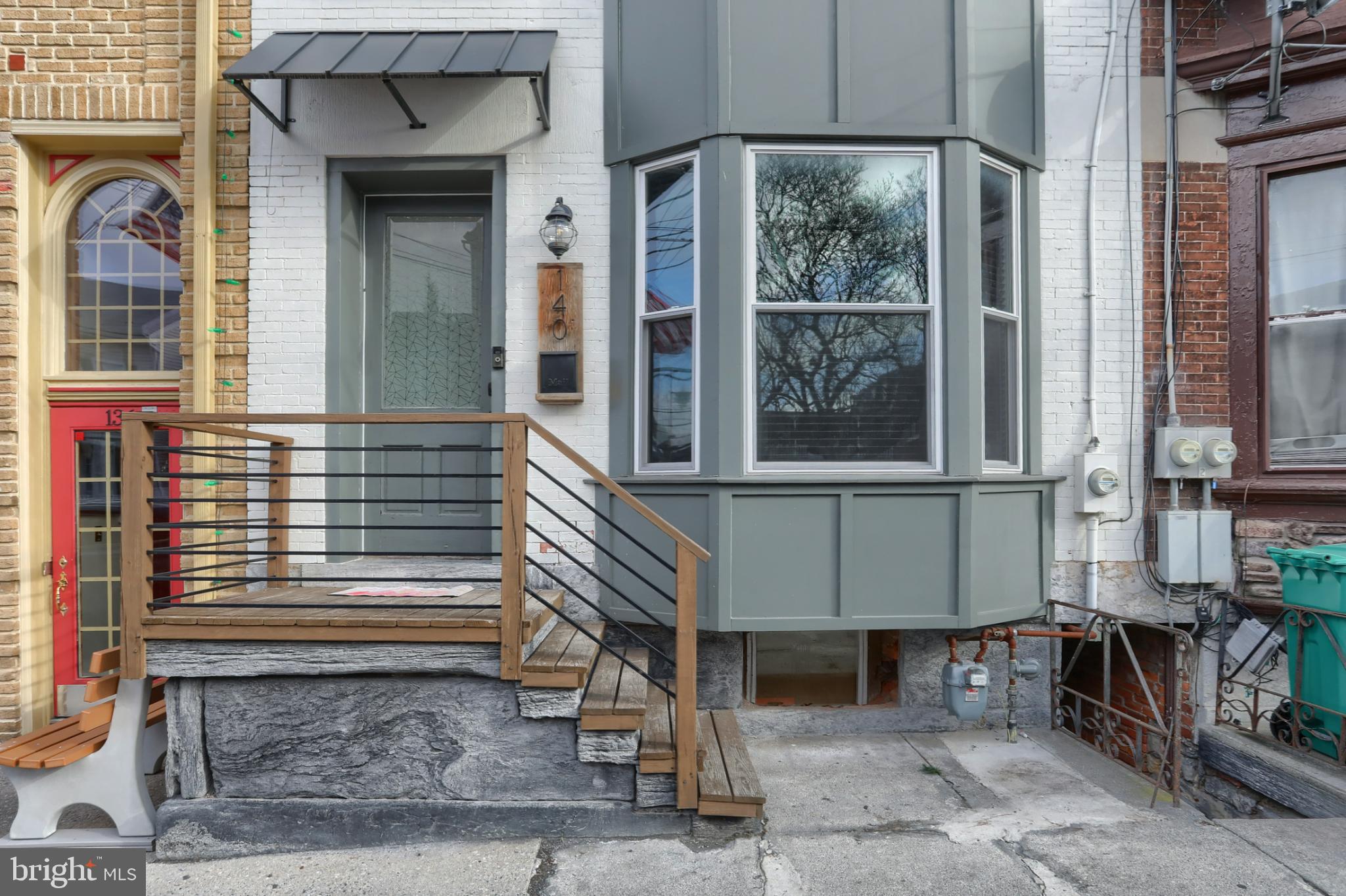 140 South 8th Street Lebanon, PA 17042 - Photo 3 of 34 a front view of a house with a garage