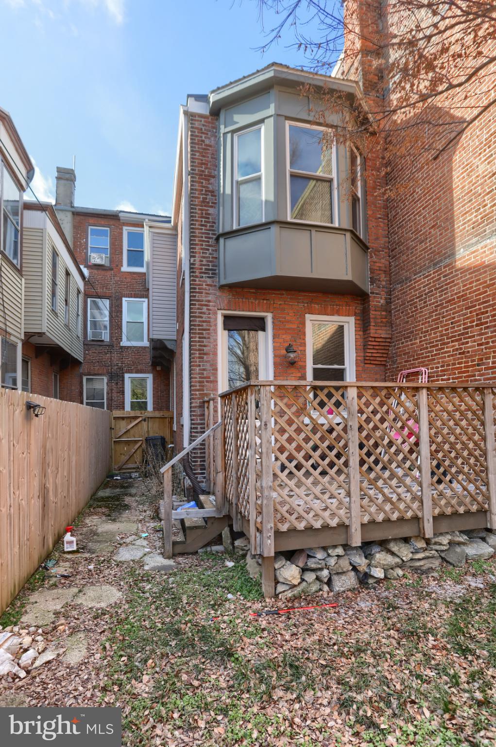 140 South 8th Street Lebanon, PA 17042 - Photo 33 of 34 a front view of a house with a large tree