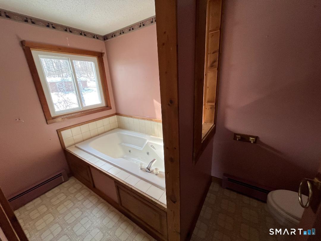 37 Potter School Road Willington, CT 06279 - Photo 21 of 31 a view of bathroom with shower and mirror