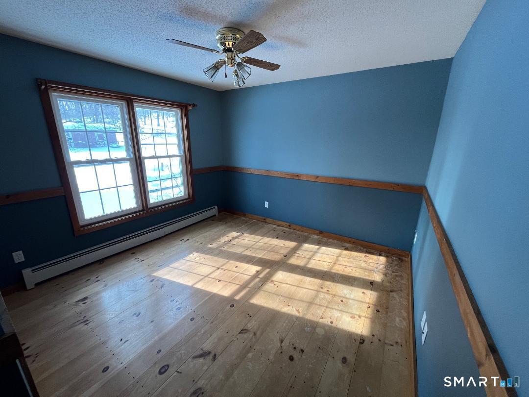 37 Potter School Road Willington, CT 06279 - Photo 22 of 31 a view of an empty room with a window