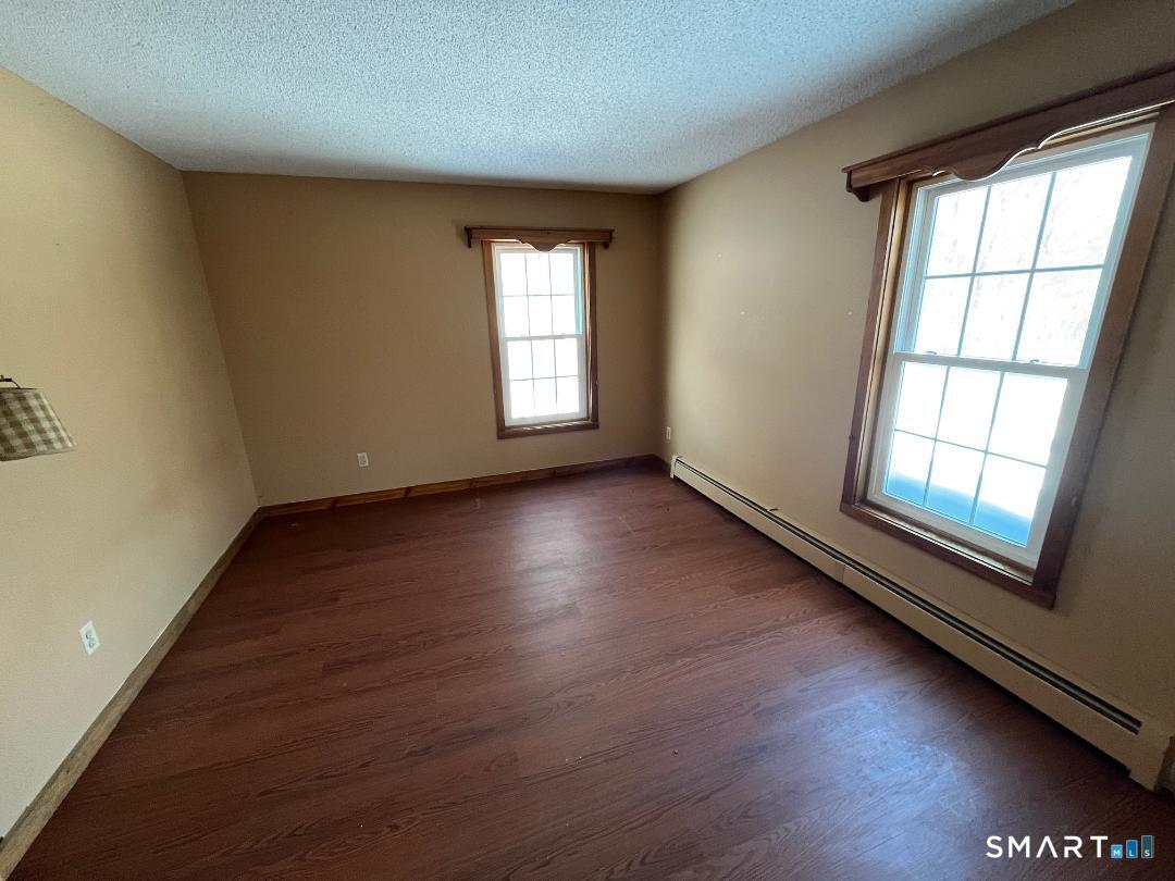 37 Potter School Road Willington, CT 06279 - Photo 26 of 31 a view of room with window and hardwood floor
