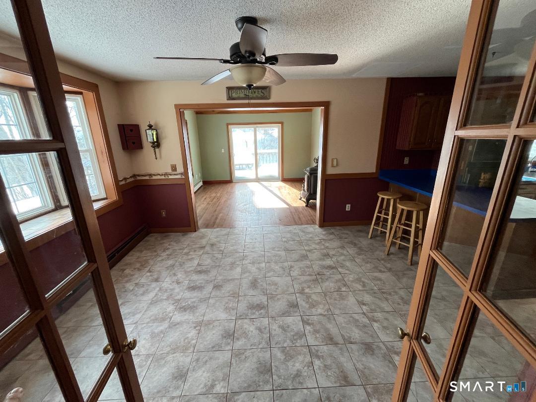 37 Potter School Road Willington, CT 06279 - Photo 6 of 31 a view of a hallway with furniture and a window