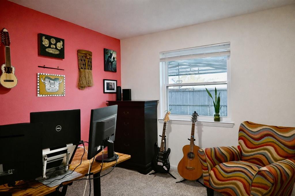 2223 Ridgedale Drive Carrollton, TX 75006 - Photo 19 of 27 a bedroom with furniture and a window