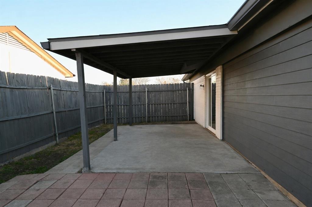 2223 Ridgedale Drive Carrollton, TX 75006 - Photo 24 of 27 a backyard of a house