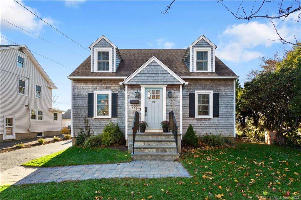 200 Reef Road Fairfield, CT 06824 - Photo 1 of 1 a front view of a house with a yard