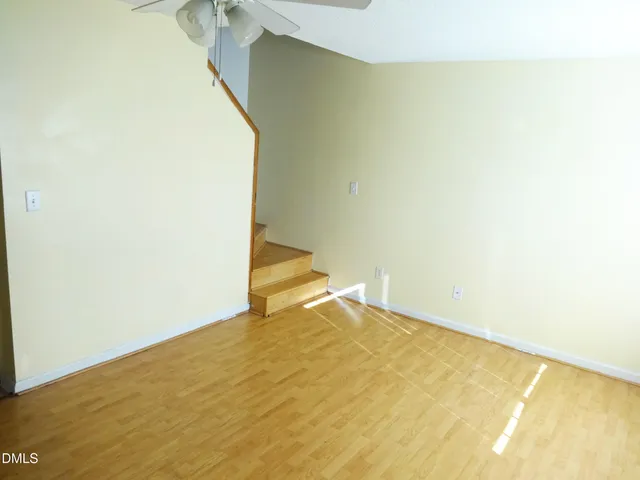 a view of a big room with wooden floor