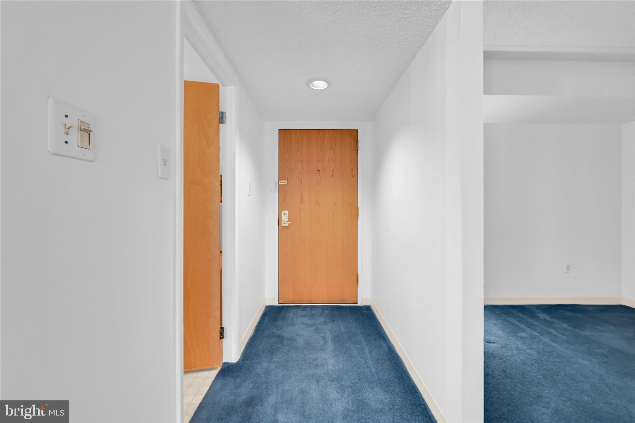 800 Avondale Road, Unit 6P Wallingford, PA 19086 - Photo 7 of 27 a view of a hallway with wooden floor