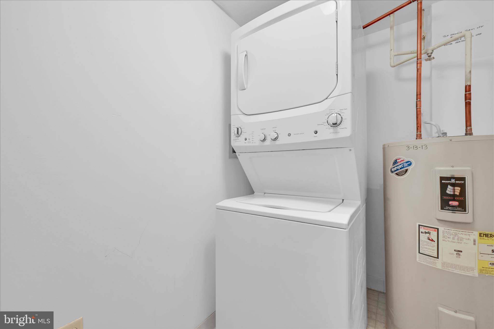 800 Avondale Road, Unit 6P Wallingford, PA 19086 - Photo 9 of 27 a utility room with dryer and washer
