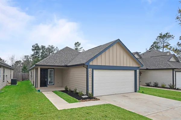 front view of a house with a yard