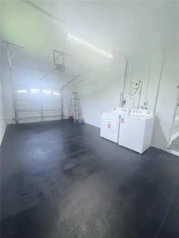 a view of a hallway with staircase