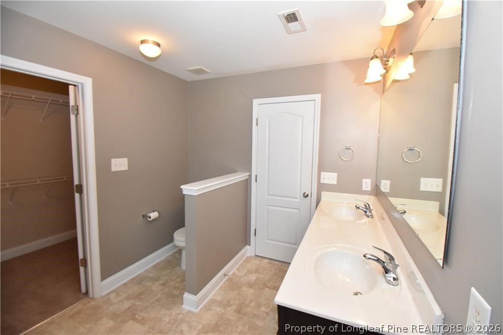 131 South Prince Henry Way Cameron, NC 28326 - Photo 11 of 26 view of a bathroom with a tub sink and mirror
