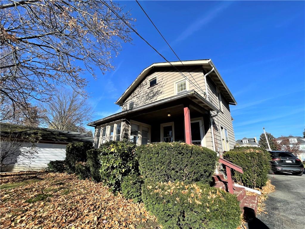 309 East Elizabeth Street New Castle, PA 16105 - Photo 1 of 13 a view of a house with a yard