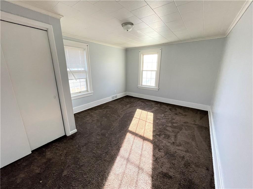 309 East Elizabeth Street New Castle, PA 16105 - Photo 12 of 13 wooden floor in an empty room with a window