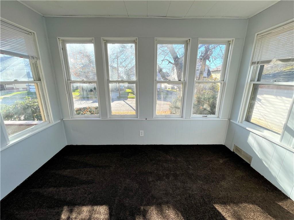 309 East Elizabeth Street New Castle, PA 16105 - Photo 6 of 13 a room with wooden floor and a window