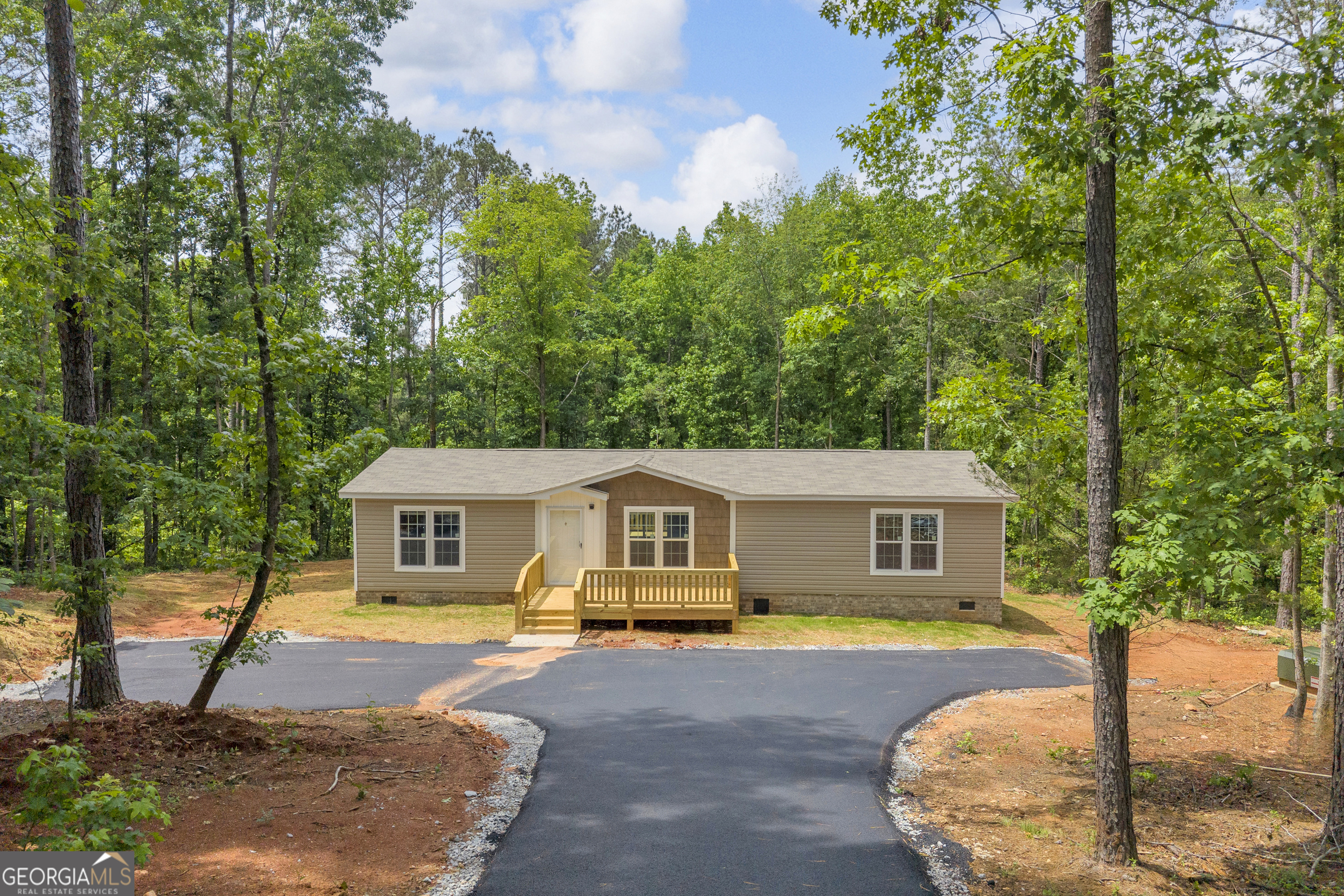 3442 Highway 29 Street South Colbert, GA 30628 - Photo 2 of 39 a swimming pool with outdoor seating and yard