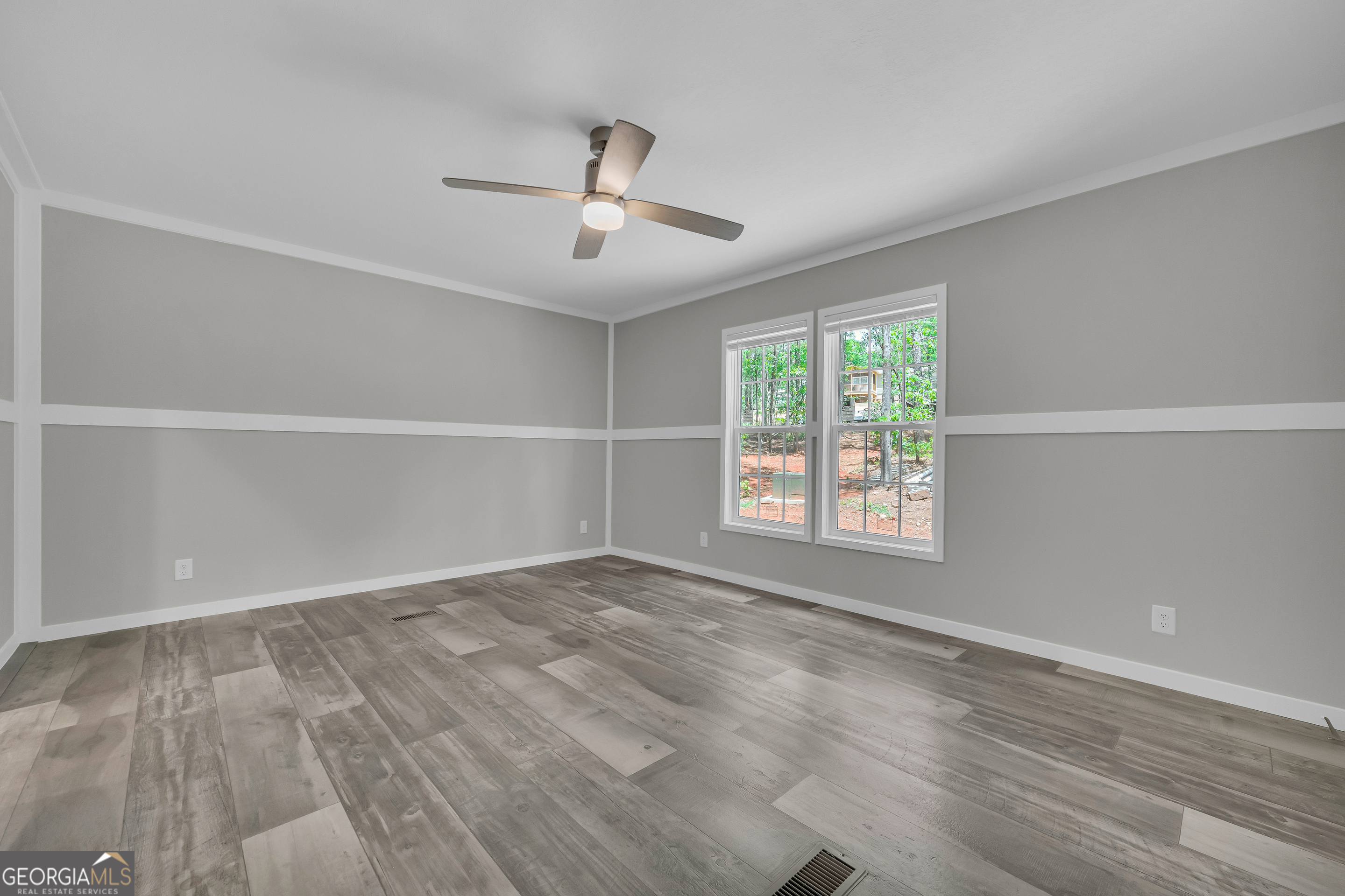 3442 Highway 29 Street South Colbert, GA 30628 - Photo 29 of 39 wooden floor in an empty room with a window