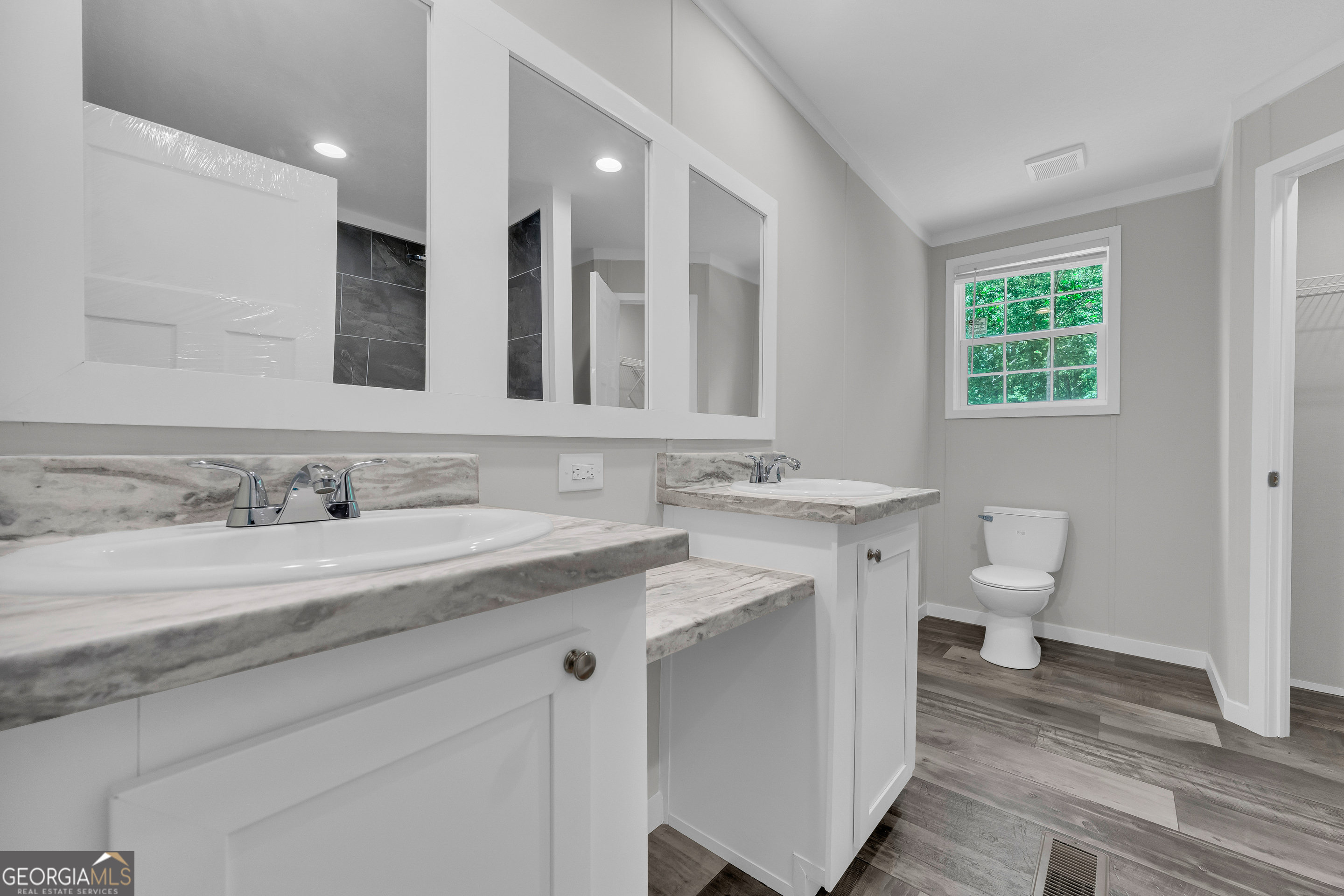 3442 Highway 29 Street South Colbert, GA 30628 - Photo 31 of 39 a bathroom with a sink and a toilet