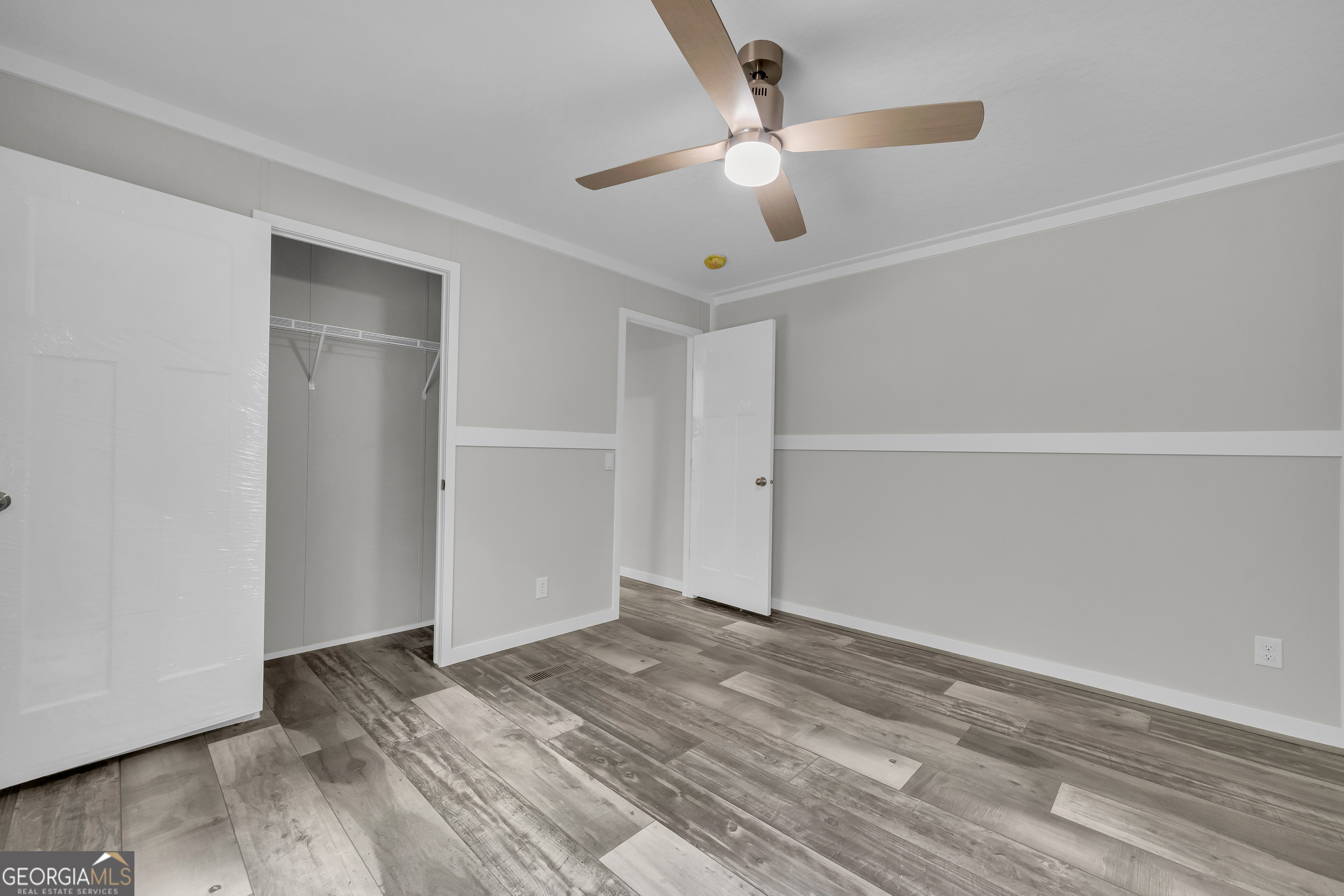 3442 Highway 29 Street South Colbert, GA 30628 - Photo 39 of 39 wooden floor in an empty room
