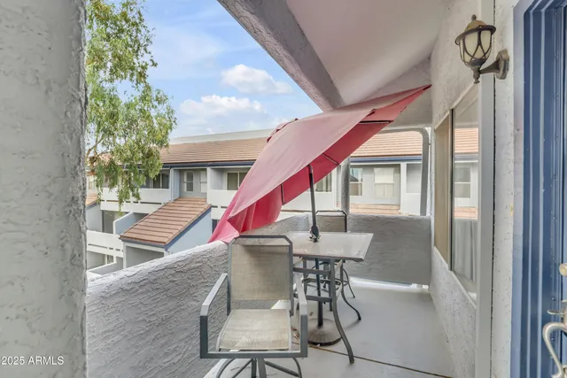 a bedroom with a bed and a cabinets