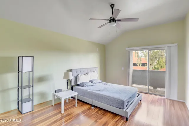 a bathroom with a sink double vanity granite and a mirror