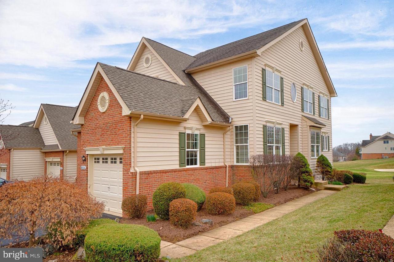 43132 Baltusrol Terrace Ashburn, VA 20147 - Photo 1 of 22 a view of a house with a yard and plants
