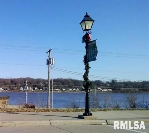 a front view of a building with lake view